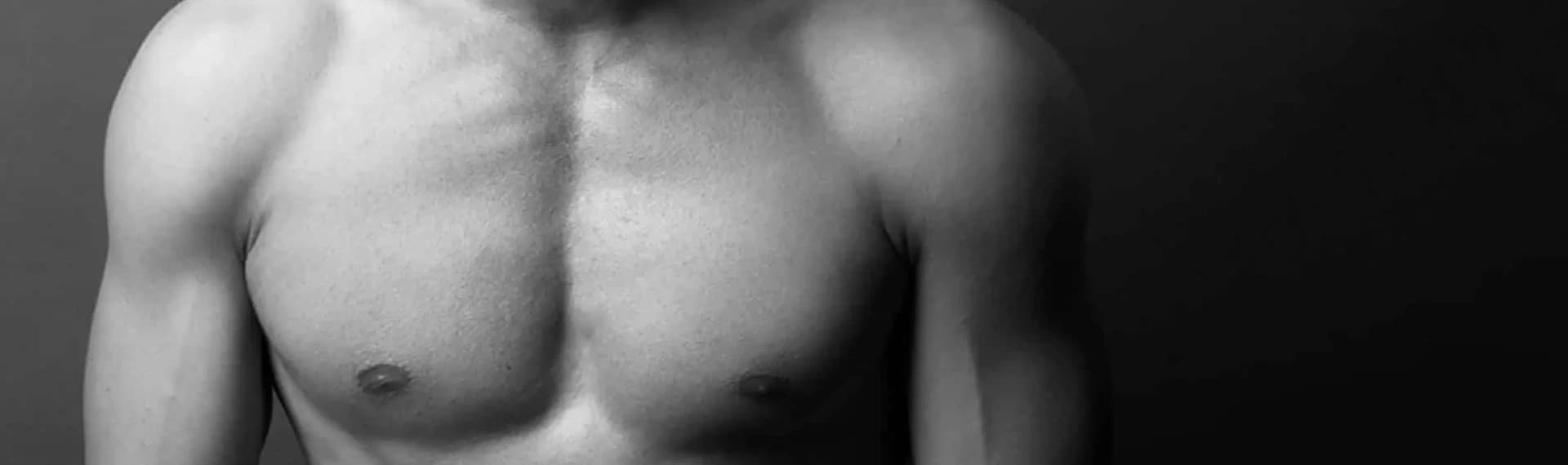 A black and white photo of a shirtless man displaying gynecomastia before and after transformation.