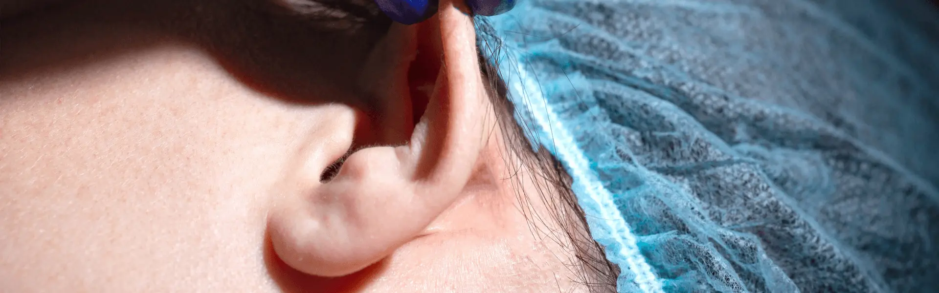A close up of a person's ear.