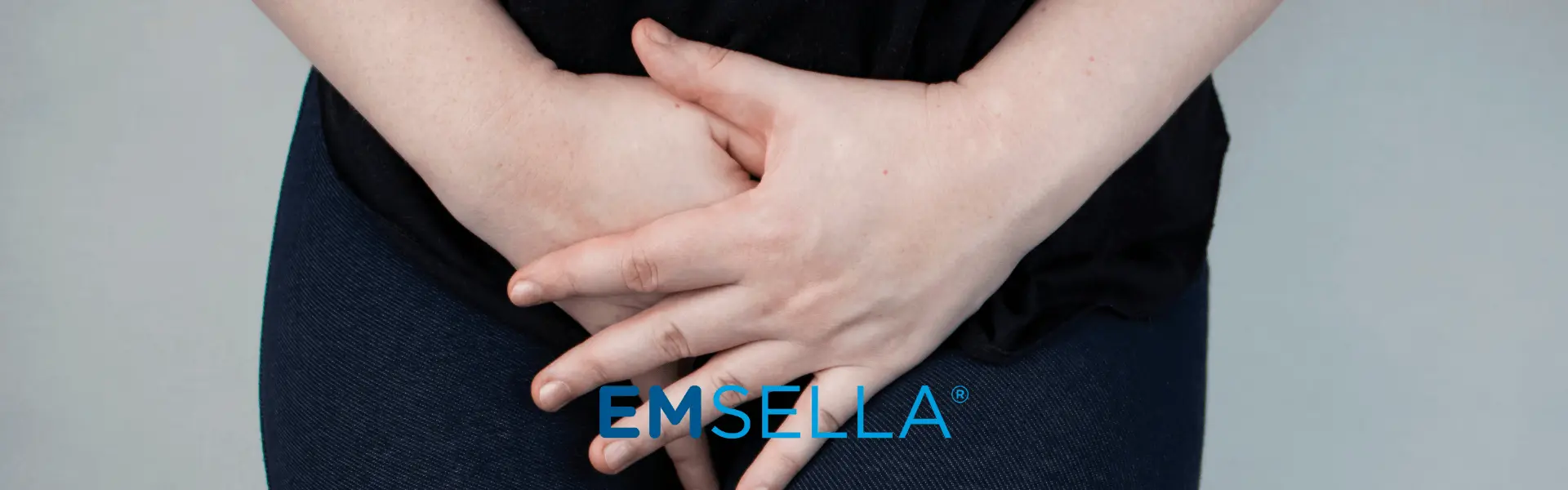 A woman's hands with the word ensella written on them.