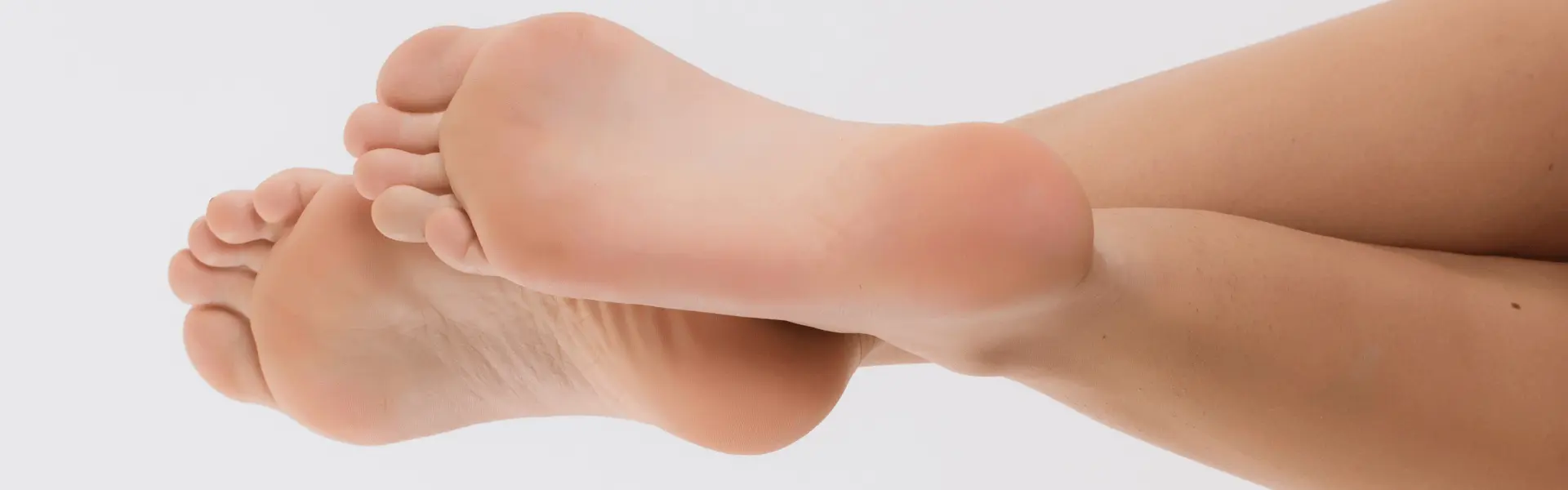 A woman's feet on a white background.