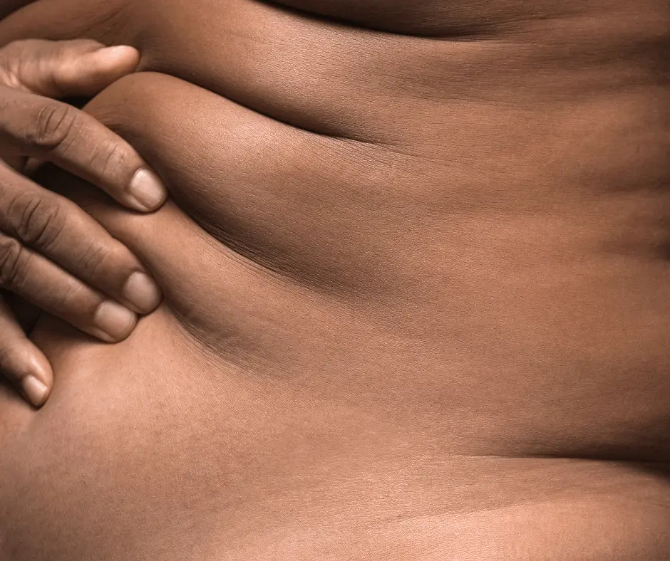 A micro close up of a woman's stomach.