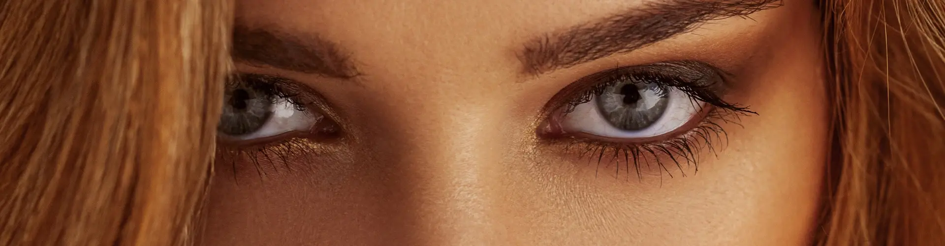 A close up of a woman's eyes.