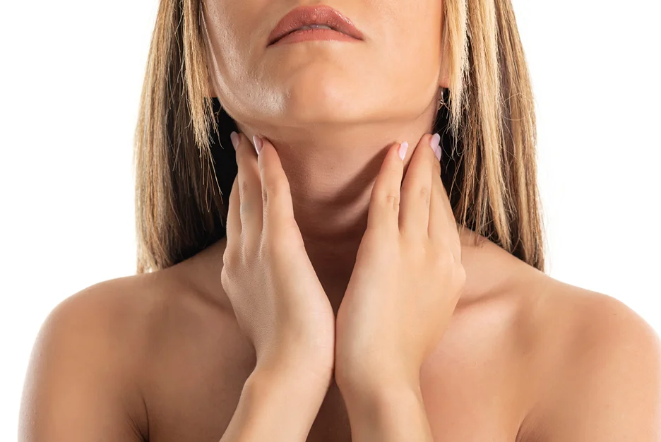 A woman showing her chin and her slimmer neck.